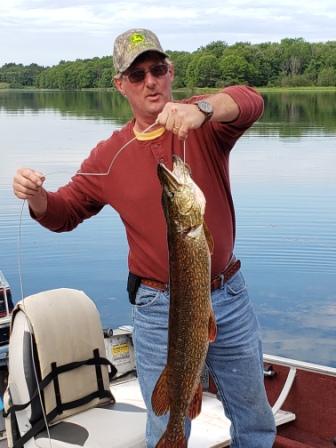 Dave B. with a 35-inch pike from Rainbow Bay Resort on Benoit Lake, Burnett County, Wisconsin, June 2019.