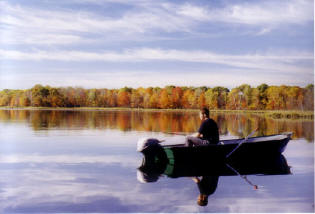 Our neighbor, Alex, enjoys a relaxing fall afternoon on Benoit Lake.