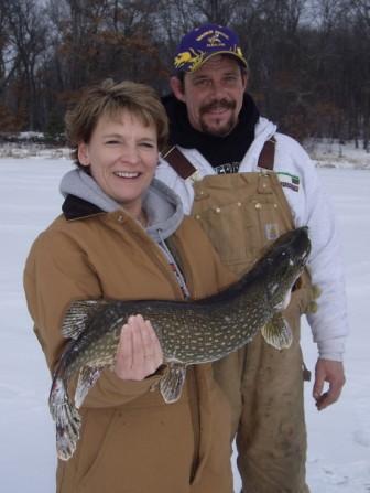 Amber and Rick S. with a 30-inch pike from Rainbow Bay of Benoit Lake, February, 2008.