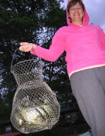 Carolyn B with a basket full of Benoit crappies, spring 2008.