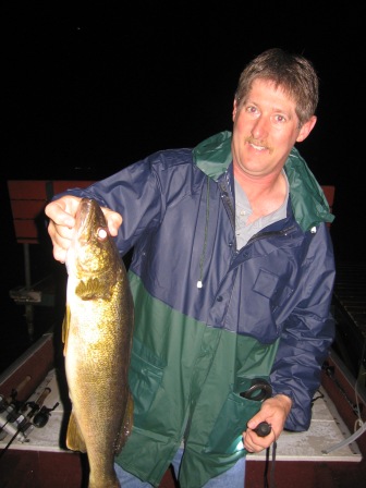 Dave B. with a nice 24 inch walleye from Benoit Lake.  Carolyn B was the photographer.  June 5, 2010.