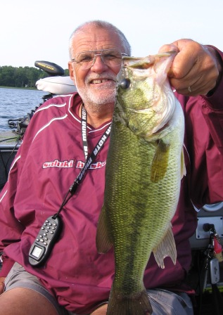 Dave R caught and released this bass on a nearby lake.  He was fishing along the deep weed line.  July 2, 2012.