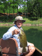 Me with a nice smallmouth bass from an area lake, May 2006.