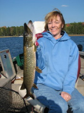 Deanna Vota with a nice pike she caught and released on Benoit Lake.