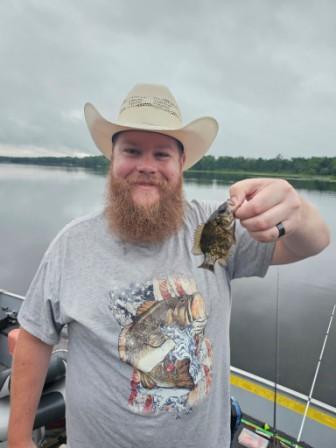 Dylan is all smiles as he releases this little guy!  July 2025.