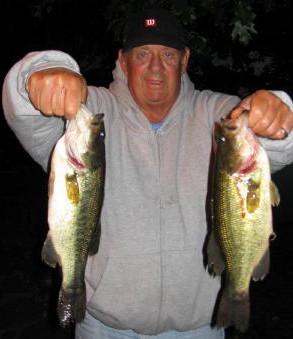 Cousin George C. with a pair of good bass from Benoit, circa 2005.