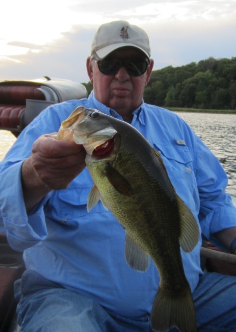 Cousin George C with a nice largemouth from a nearby lake.  He and his son, Mark, were flippig soft plastic baits near docks.