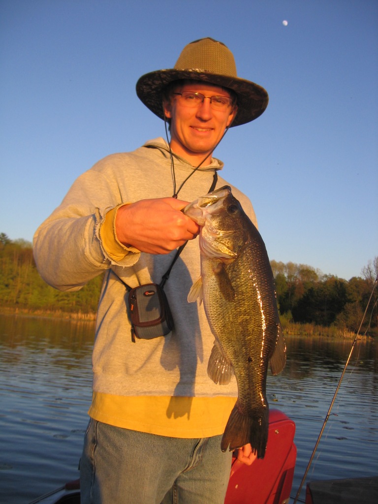 Jake C. with a 17 inch bass he caught and released on Benoit Lake, May 2016.  He was using a soft plastic bait in a shallow bay.