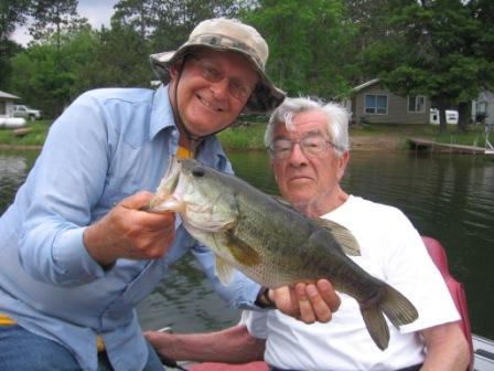 Dave and George C with a healthy bass caught and released on Benoit Lake, June, 2016. Dad, may you rest in peace.