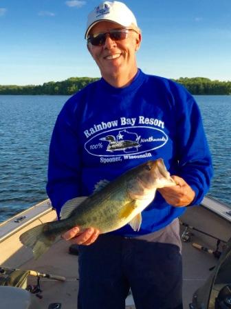 Jack N. with a 19-inch bass he caught and released on Benoit Lake, June 2016.
