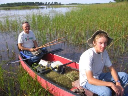 Jake and me, Dave, in our canoe after gathering about 50 pounds of wild rice on a Burnett County Lake, 2009.