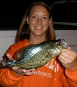 Jenn W. with a very nice crappie she caught on our dock, July 10, 2010.