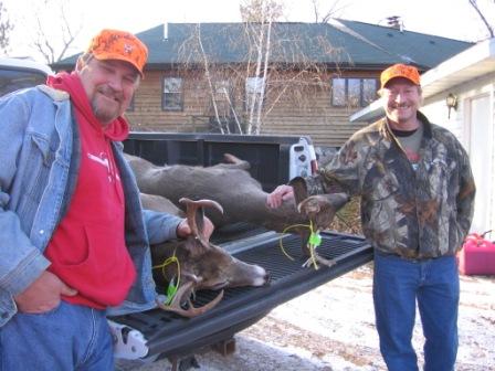 Jim and Joe with a couple of nice bucks the "He-Men" harvested during the 2008 gun season.