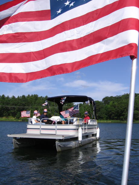 My neighbors in the fourth of July boat parade on our lake, 2006.