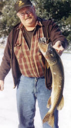 Kim B. used a shiner and tip-up to catch this 34 inch pike from Benoit.