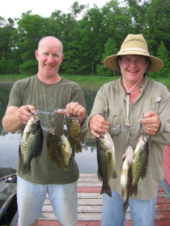 Mike and Tina D with a variety of nice eating fish, Benoit Lake, June 2013.