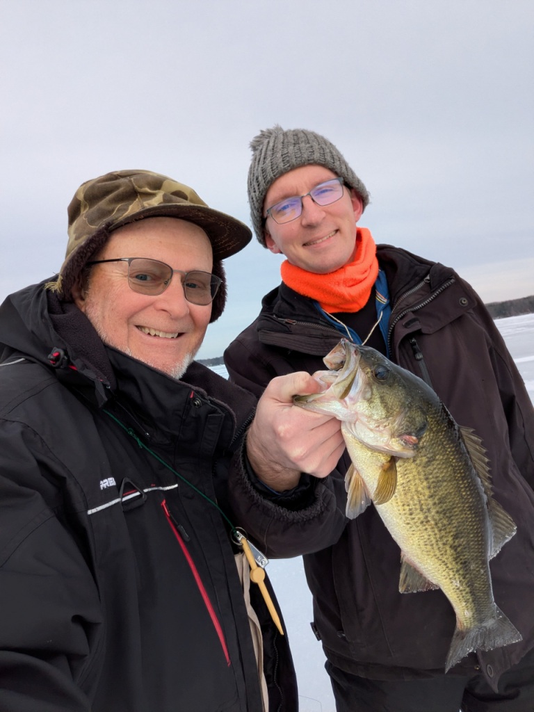 Jake and I caught bass and pike on tip ups.  December 2025.  Burnett County, Wisconsin.