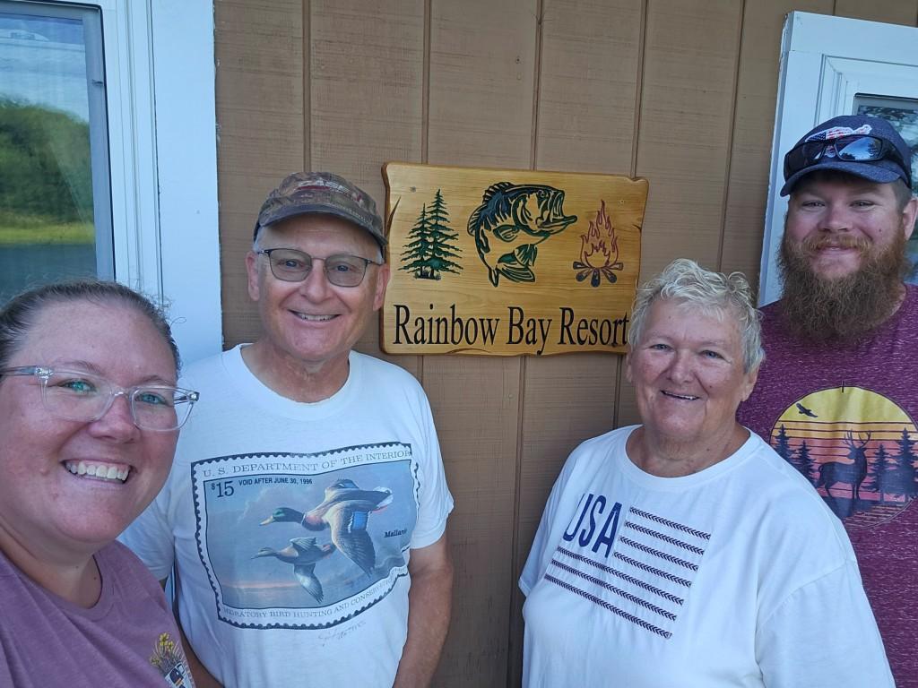 Jackie K, Dave C (me), Peggy K, and Dylan K.  The K family have been regular visitors at Rainbow Bay Resort for decades.  photo July 2025