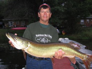 Randy J with a beautiful 38.5 inch musky he caught and released in Benoit Lake, August, 2006.