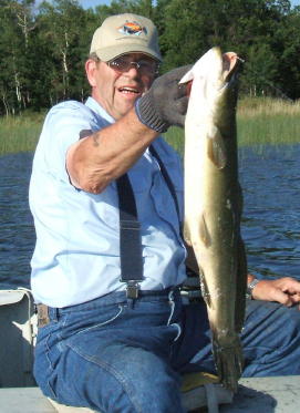 With the help of his wife Carolyn, Ray Bortle caught and released this monster bowfin on Benoit Lake. It was an exciting afternoon for them!
