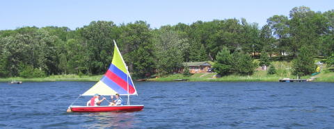 Jackie gives Jake instruction on sailing, June 2007.